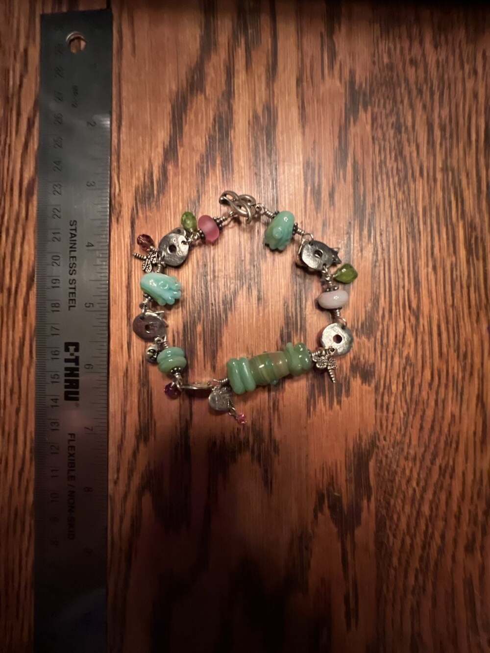 Sterling wire wrapped and Handblown Glass Beaded and charm Bracelet